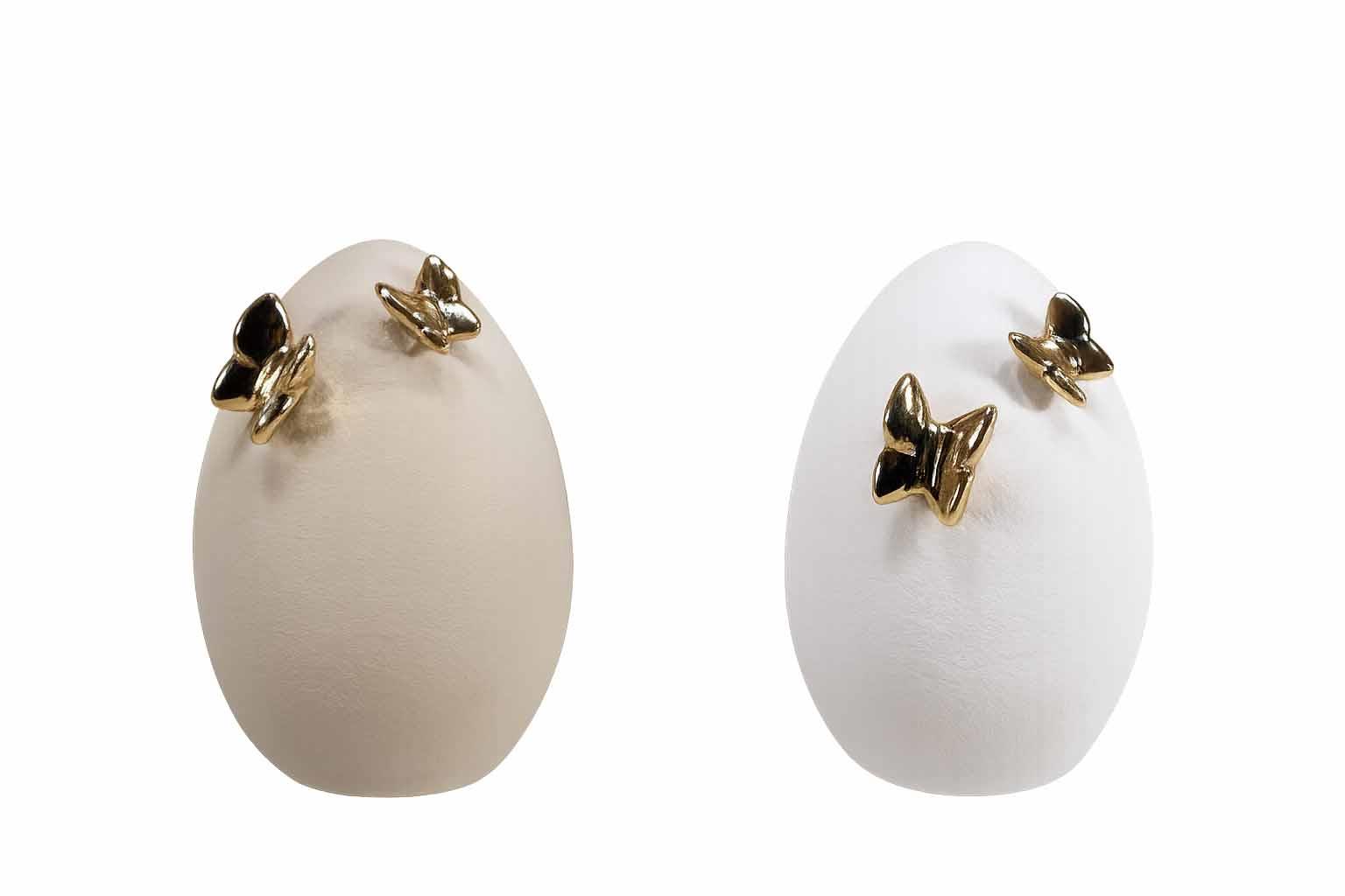 Ei steh. Porzellan m. Schmetterlingen gold H14cm weiß-creme